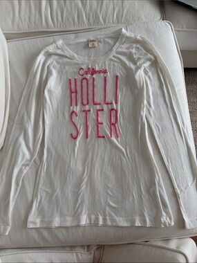 Hollister White Long-Sleeve Tee with Pink Logo Embroidery Y2K